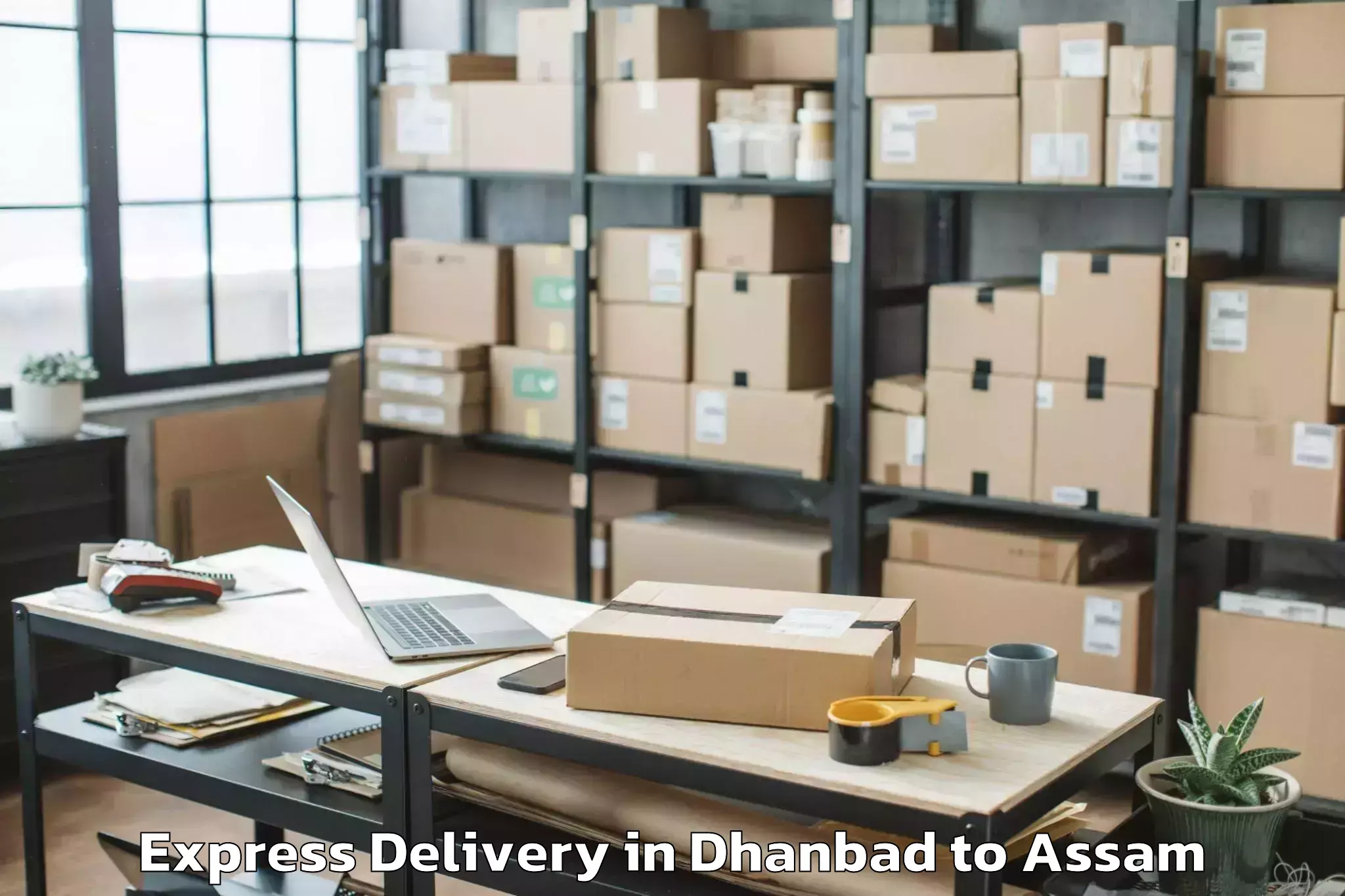 Book Dhanbad to Goshaingaon Express Delivery Online